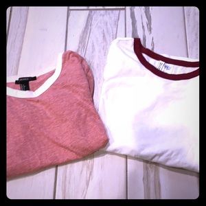 pink shirt with white and white shirt with maroon